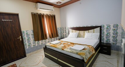 Omji Niwas - Kalyan Keshar Dham Room Type - Deluxe Double Rooms