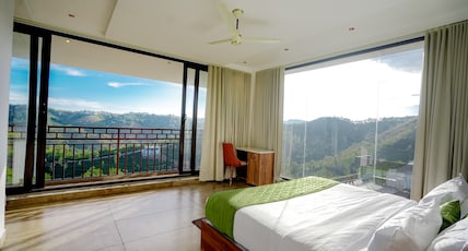 Golden Meadows by Dwellsmith Virtue Holidays Room Type - Premium AC Cottage with Private Living & Balcony