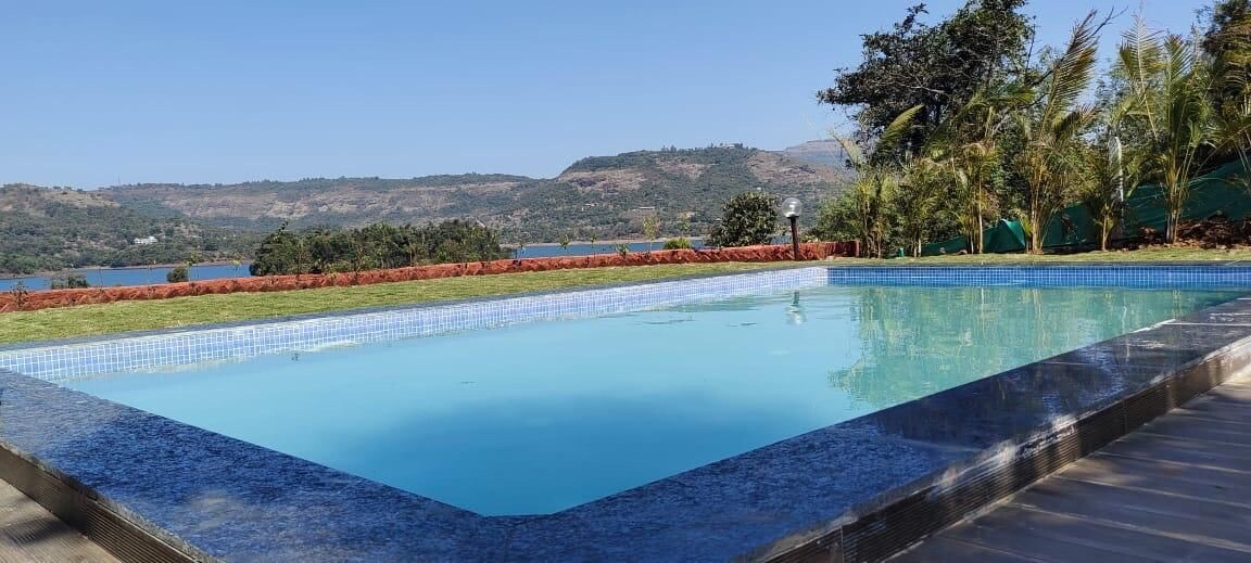Kuteer by the lake 4bhk lake-Touch with private pool Pawna Lake Lonavala By The Explorer Stays - Tap to explore photos