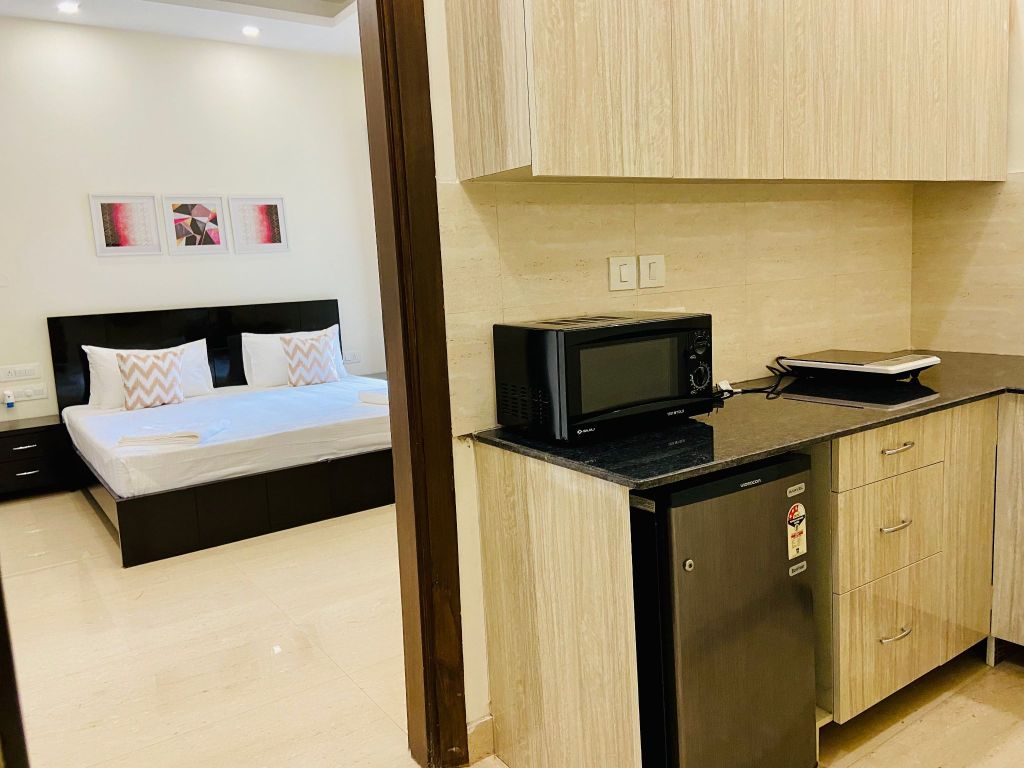 Olive Studio Apartment Cyber City - Tap to explore photos