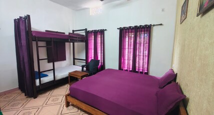 Red Poppy Home Stay Room Type - Deluxe Non AC Family Room