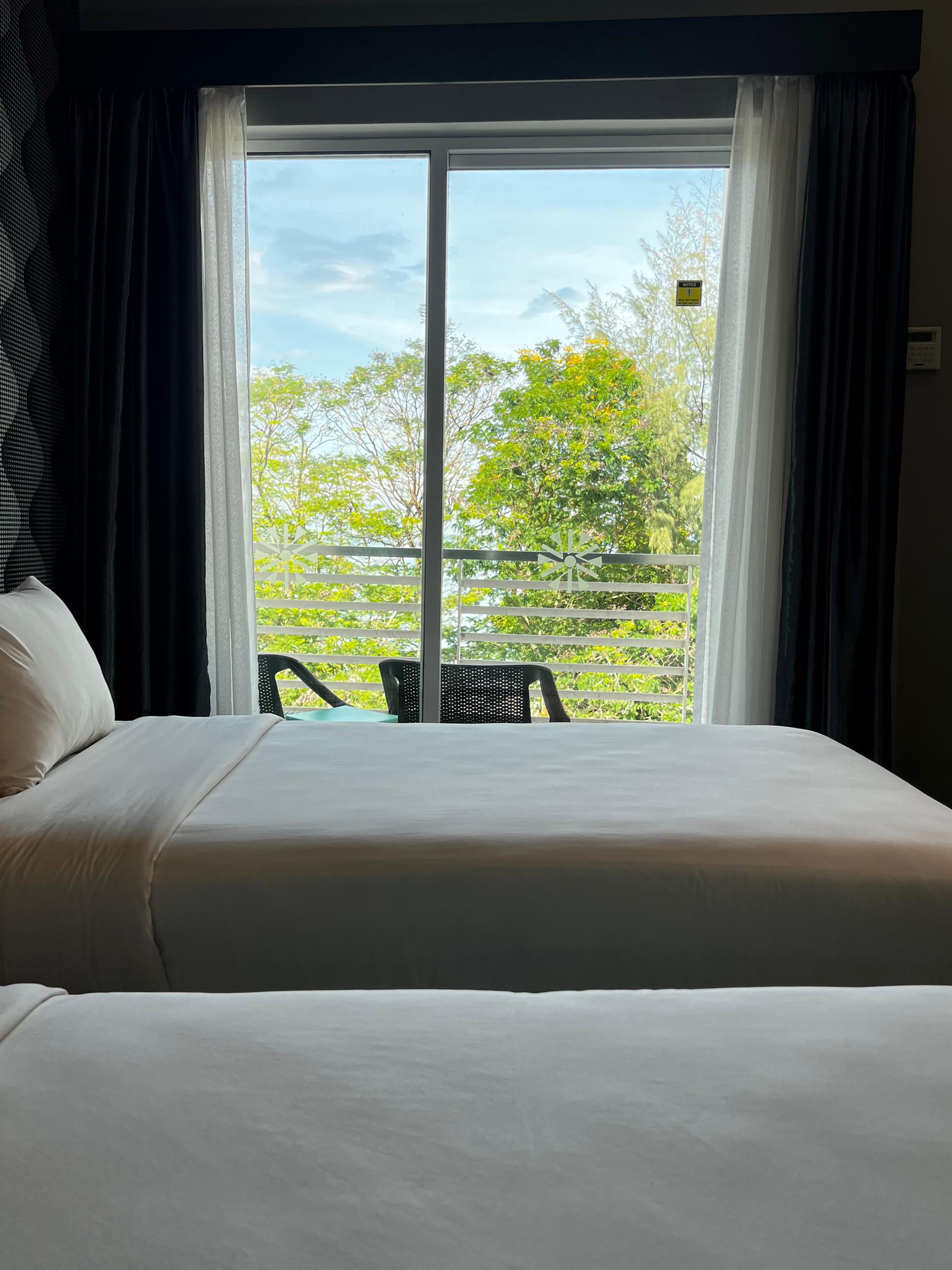Cenang Plaza Beach Hotel - Tap to explore photos
