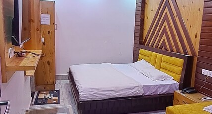 Krishna Hotel AS Room Type - Deluxe Room