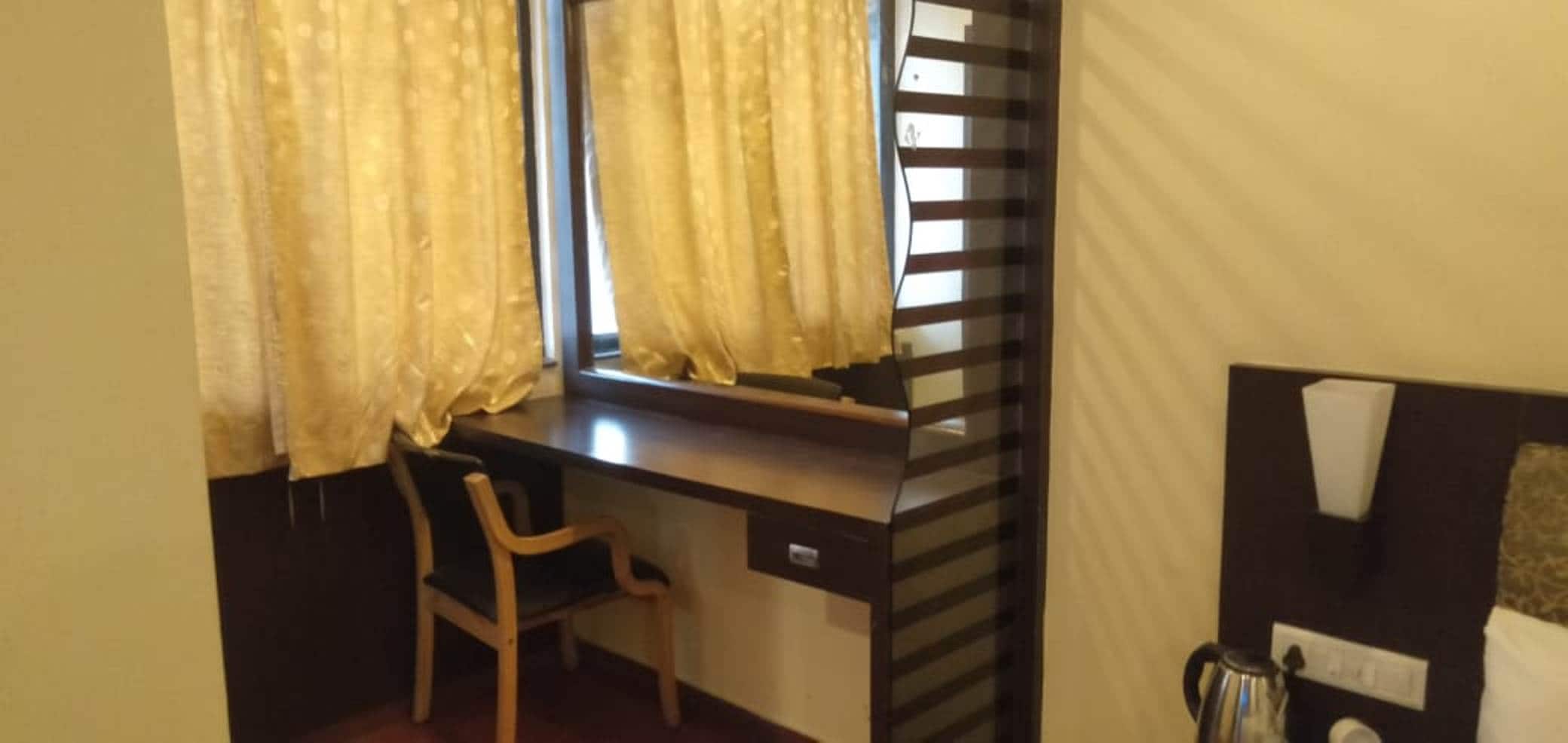 Hotel The Uday Regency - Tap to explore photos
