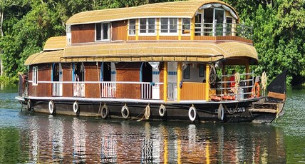 The Botel Alleppey Houseboats by EGH Room Type - Deluxe Sharing Rooms with 24hrs AC - FREE - Tender Coconut,Banana leaf Sadhya, kayaking ,live music The Botel Alleppey Houseboats by EGH Room Type - Deluxe Sharing Rooms with 24hrs AC - FREE - Tender Coconut,Banana leaf Sadhya, kayaking ,live music