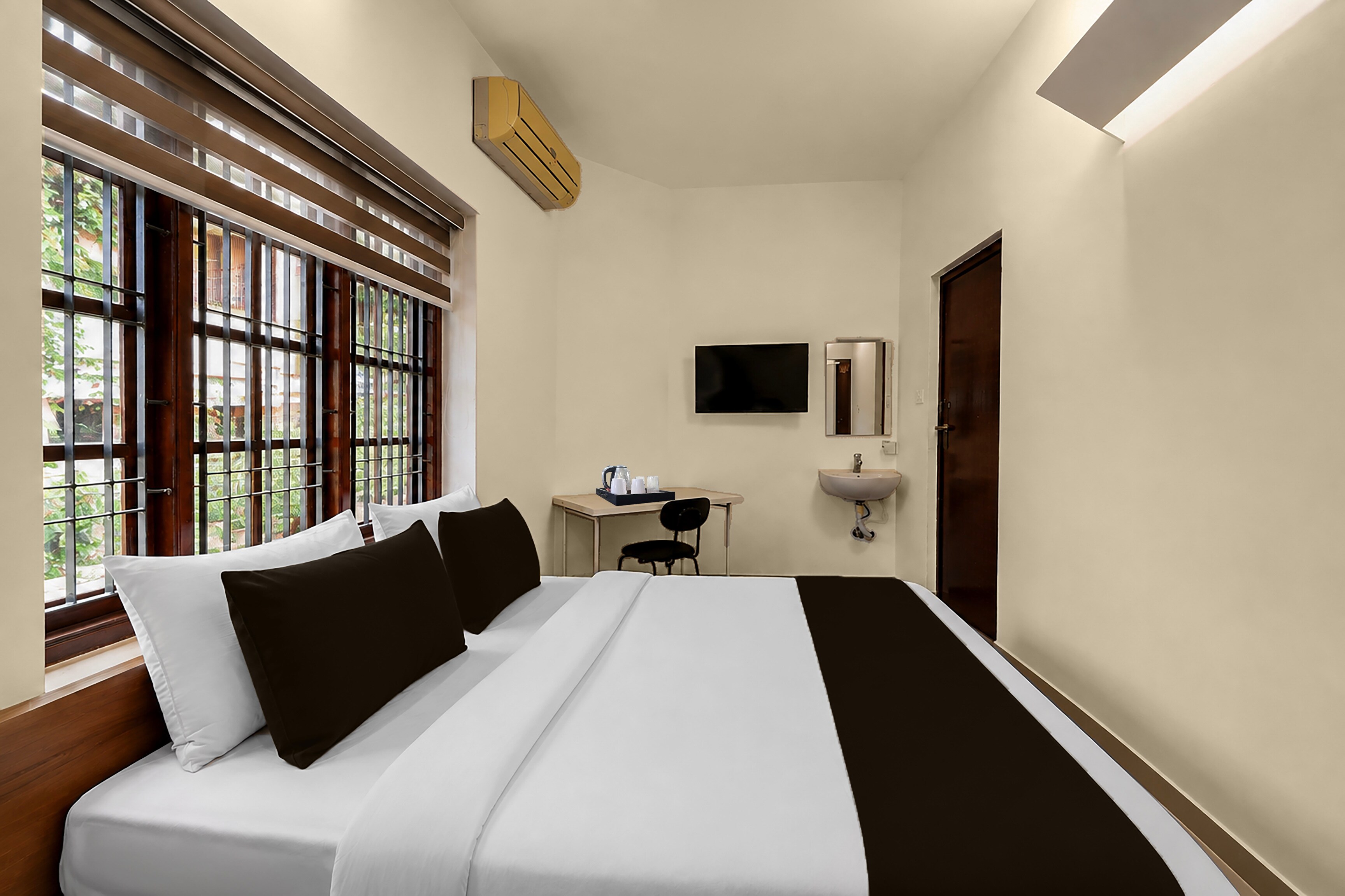 Hotel O Trivandrum Technopark Phase 1 Formerly Daffodils - Tap to explore photos