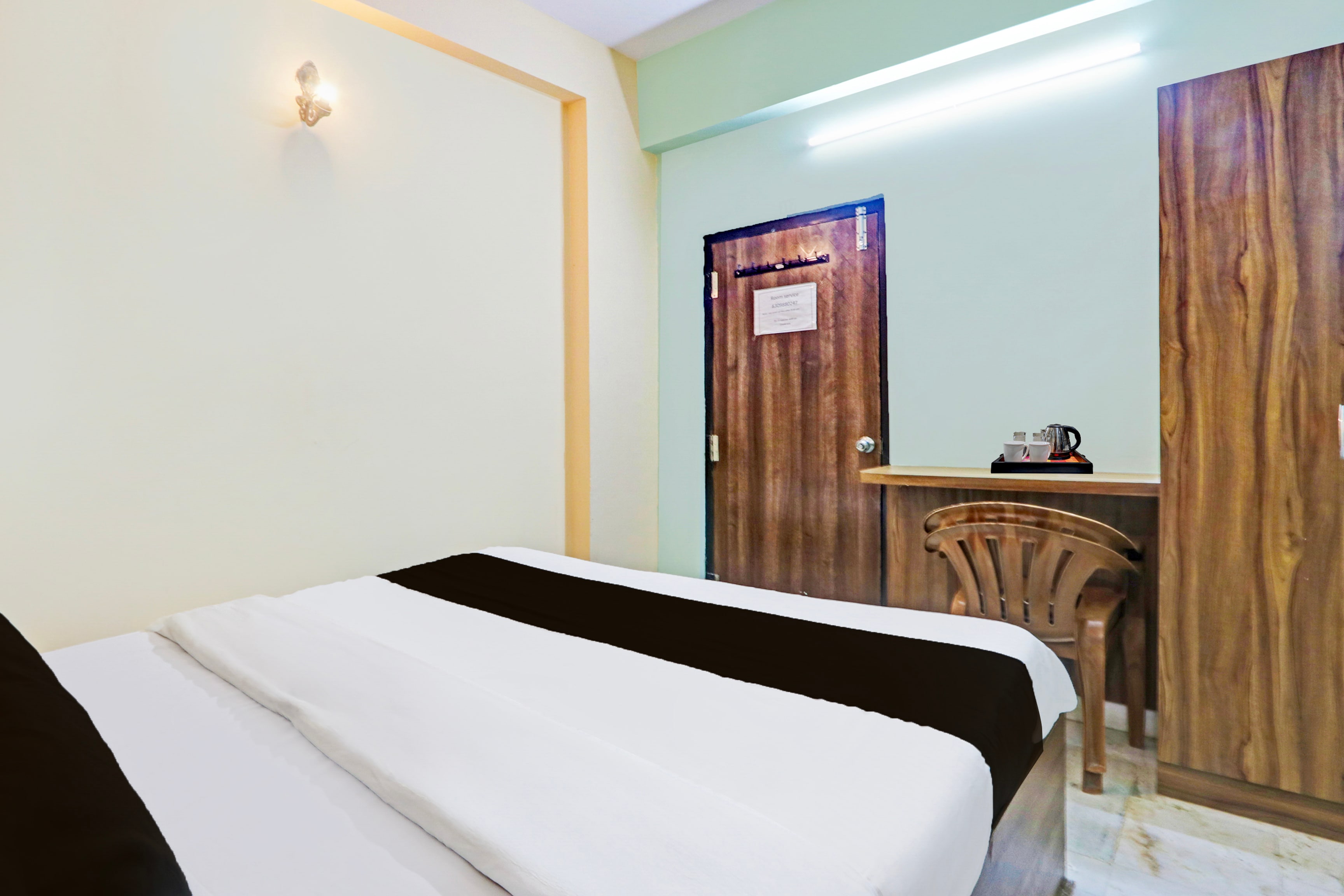 Super Hotel O Karimnagar - Tap to explore photos