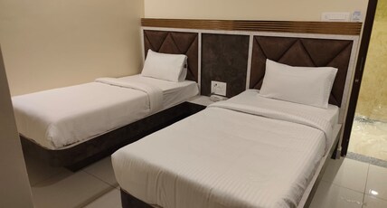 Kings Residency Room Type - DELUXE TWIN BED ROOM