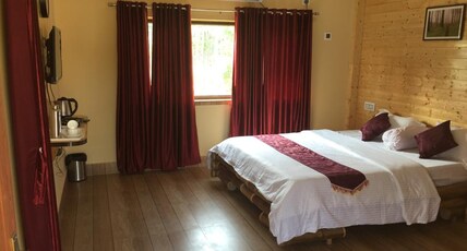 SUMARU JUNGLE RESORT Room Type - AC DELUXE DOUBLE BED ROOM