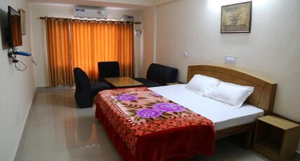 Hotel Highland Regency Room Type - Deluxe Room AC