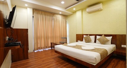 Hotel Madhuri Executive( 3 Minutes Walk to Mahalaxmi Temple ) Room Type - Madhuri Suite
