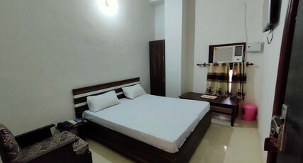 Arjun Guest House Room Type - Deluxe AC Room