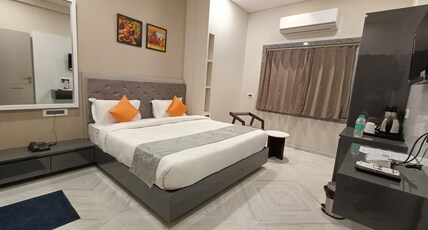 Hotel Shri Anand Dham (5 min walk from Temple) Room Type - Deluxe Room