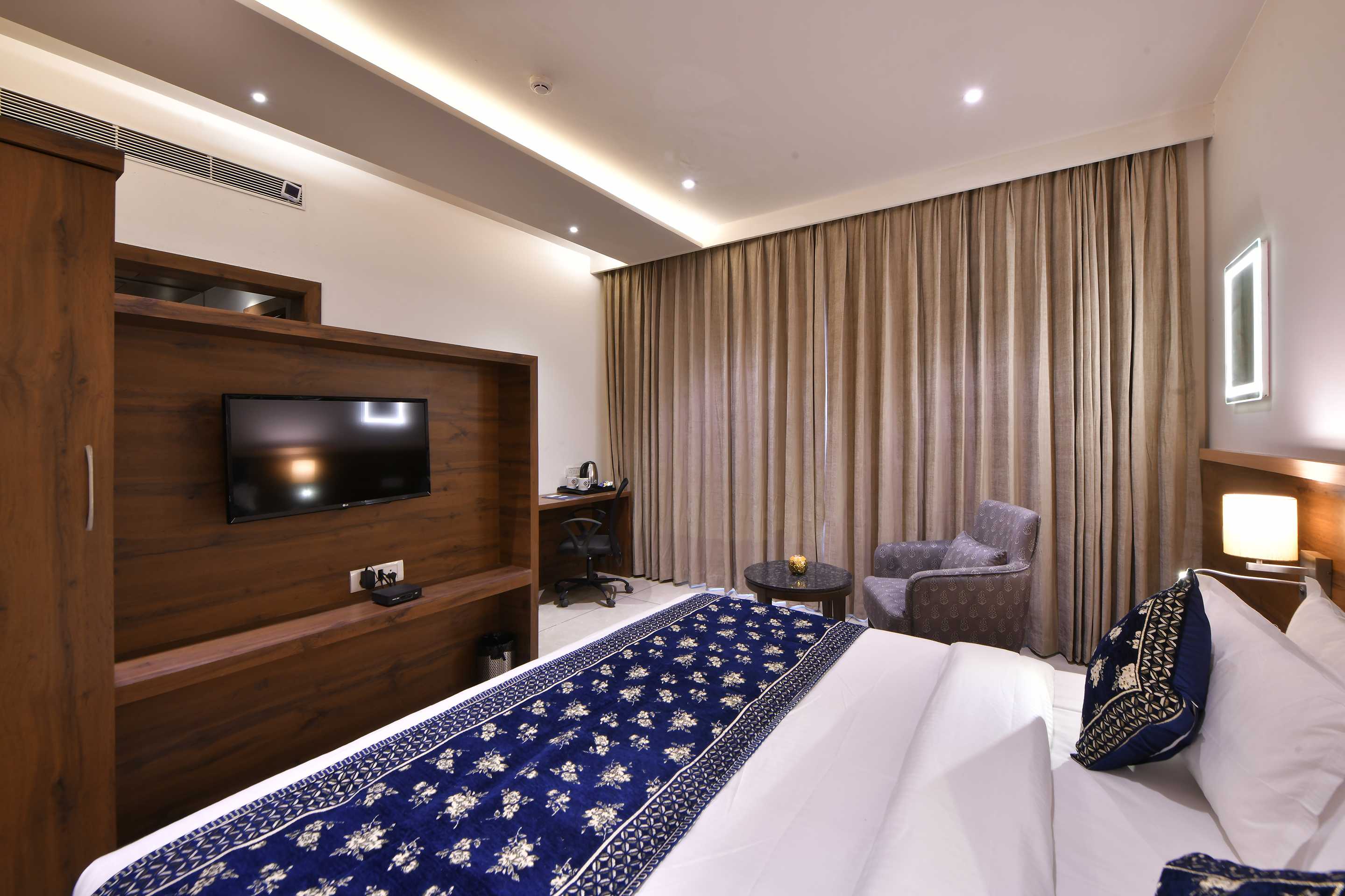 Clubhouse Hotel Morbi by CheckIn - Tap to explore photos