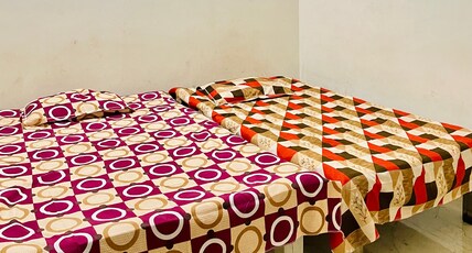 Om Sai Guest House Room Type - Bedroom 1