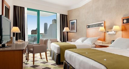 Hilton Dubai Jumeirah Room Type - TWO QN DLX RM SEA VW-BLCNY