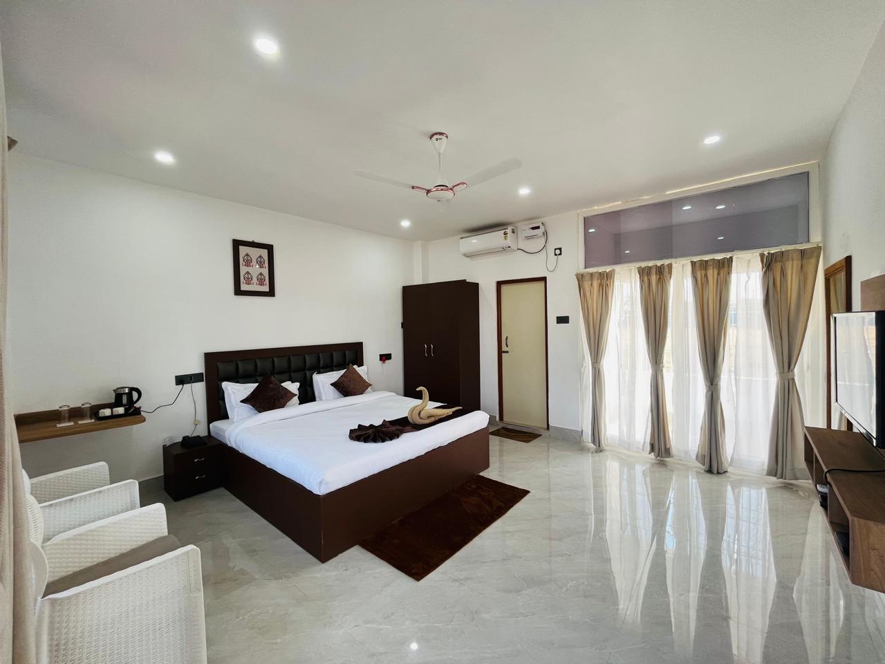 Aahaar Numaligarh | Premium Stay With Restaurant - Tap to explore photos