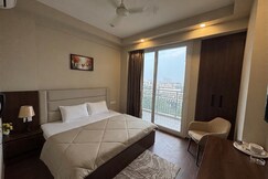 Address of 10 minutes away from ExpoMart The Hideaway Stays