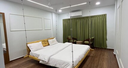 DHANLAKSHMI ORCHARD RESORT Room Type - Luxury Room With Swing Bed