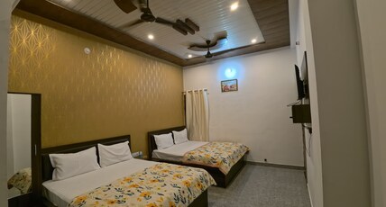 Hotel Daksh (Free Gated Parking & 10 Min walk from Temple) Room Type - Super Family Room ( 2 Double Bed | 4 Pax )