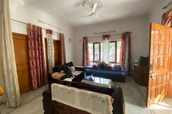 Vishal Homestay | Airy Rooms & Kitchen