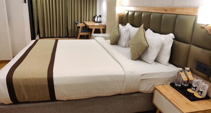 The M Hotel Raipur Junction Room Type - Super Deluxe King Bed with Mini Fridge