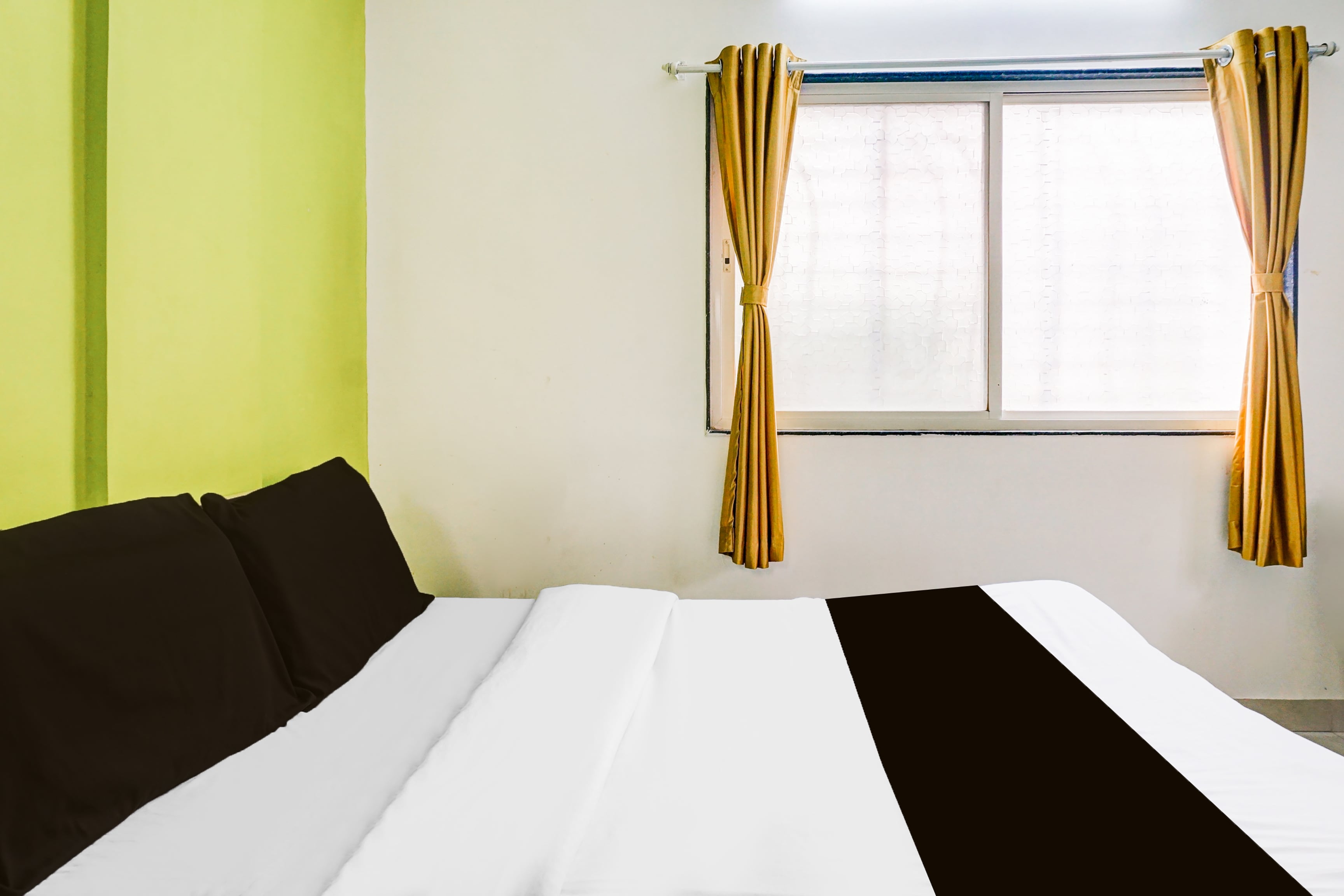 Hotel O Elite Studio - Tap to explore photos