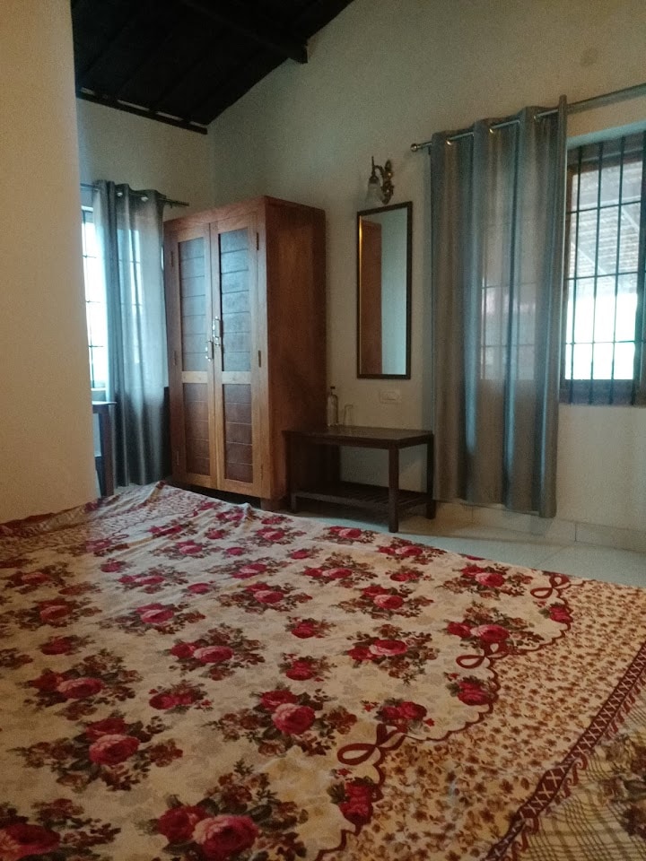 Ambika Homestay | Rooms & Caretaker - Tap to explore photos