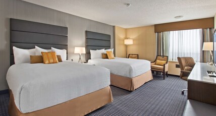 Best Western Premier Calgary Plaza Hotel & Conference Centre Room Type - 2 Queen Beds, Non-Smoking, Executive Room, Pillow Top Mattress, Microwave And Refrigerator Best Western Premier Calgary Plaza Hotel & Conference Centre Room Type - 2 Queen Beds, Non-Smoking, Executive Room, Pillow Top Mattress, Microwave And Refrigerator
