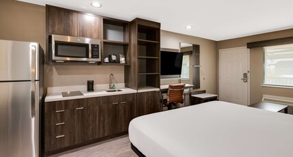 Best Western La Place Inn Room Type - Suite-1 King Bed, Non-Smoking, Sofabed, Kitchenette, Microwave And Refrigerator, Shower Only, Full B Best Western La Place Inn Room Type - Suite-1 King Bed, Non-Smoking, Sofabed, Kitchenette, Microwave And Refrigerator, Shower Only, Full B
