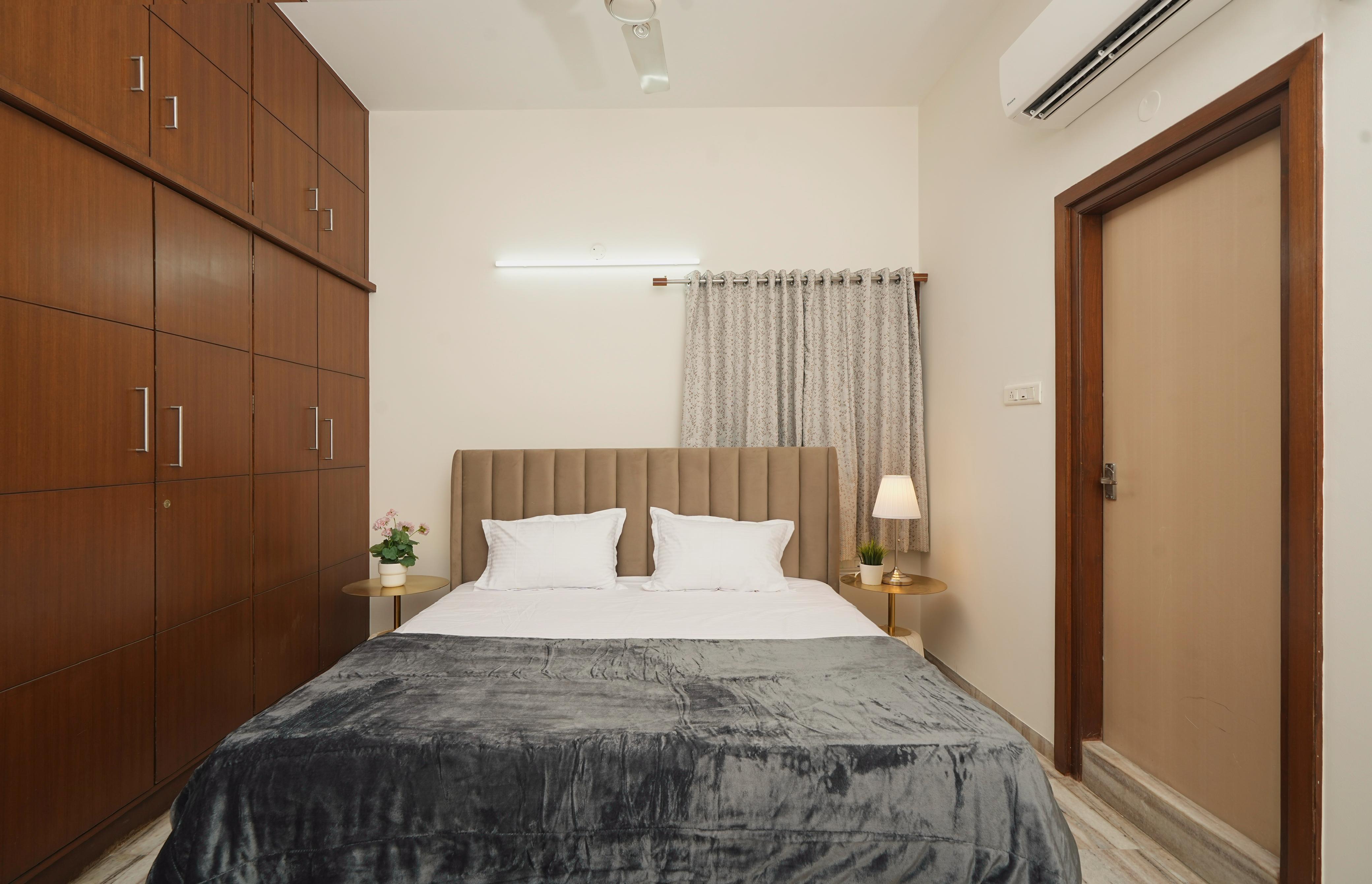 Stayzin Service Apartments - Tap to explore photos