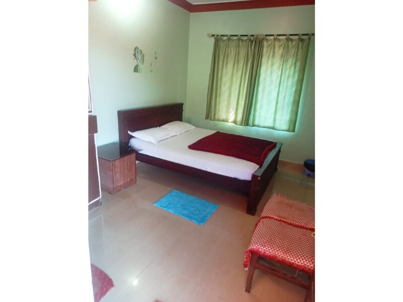 Eshwar Homestay Couple Room - Tap to explore photos