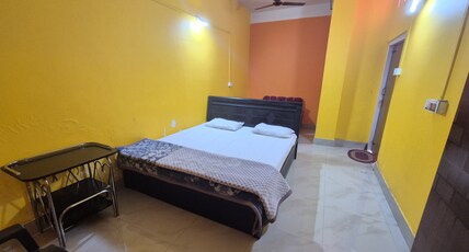 SK Lodge | 5min Walk From Airport Room Type - AC Deluxe Room With Free Wifi