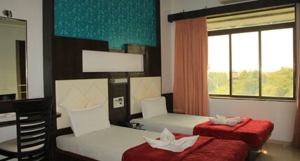 Hotel Saffron, Chikhli Room Type - Deluxe Room