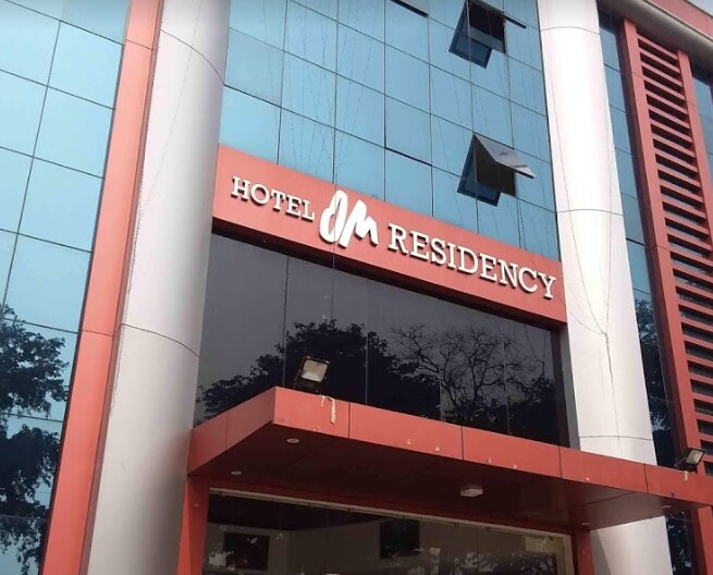 Hotel Om Residency - Tap to explore photos