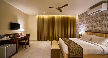 Hotel Shlok (Pure Veg) Room Type - Deluxe Non AC Room