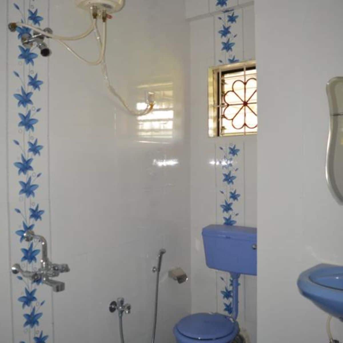 Vailankanni Guesthouse | Rooms & Kitchen - Tap to explore photos