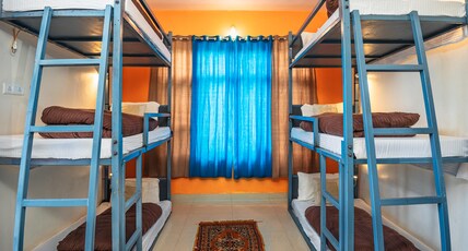 Bunker Bir Room Type - 6 bed mixed dorm with attached washroom plus balcony