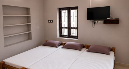 HOTEL SABAREESH Room Type - 3 Bed Standard Room AC