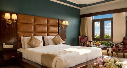 Hotel The Dewan by Royal NaQash Room Type - Deluxe Room AC - Valley View or Garden View Hotel The Dewan by Royal NaQash Room Type - Deluxe Room AC - Valley View or Garden View