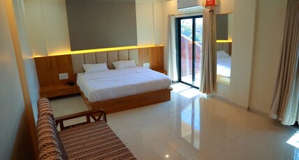 Krushnai Residency - Ginger Cafe and Restaurant, Metgutad Room Type - Deluxe Family AC room with Balcony