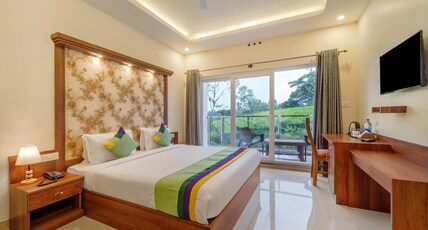 Treebo Windsong Resort Munnar, Tea Plantation View Room Type - Deluxe Room with Tea Garden view