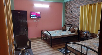 DEV- MURTI ECO RESORT ...dooars  Room Type - Luxury Deluxe Room Garden view with King size bed