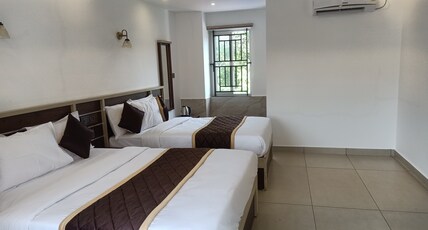 Paul Residency Nedumbassery Room Type - Super Deluxe 4 bed