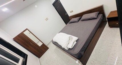 VUTUKURI GRAND Room Type - Deluxe Room