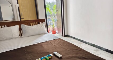 Sri Inn Room Type - Deluxe Room with Balcony