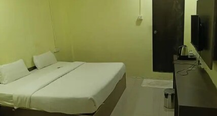 Via Nisarg Blue Room Type - Deluxe Room