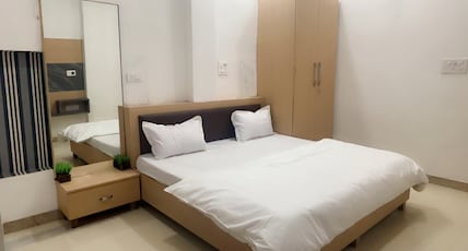 Harshan Homestay Inn   in Ranjit Avenue Room Type - Bedroom 3