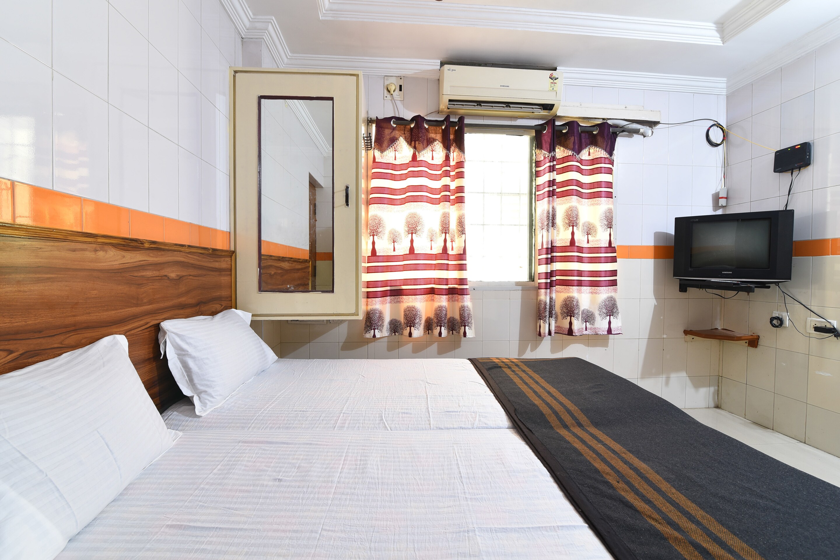 SPOT ON Hotel Dhruvathara - Tap to explore photos