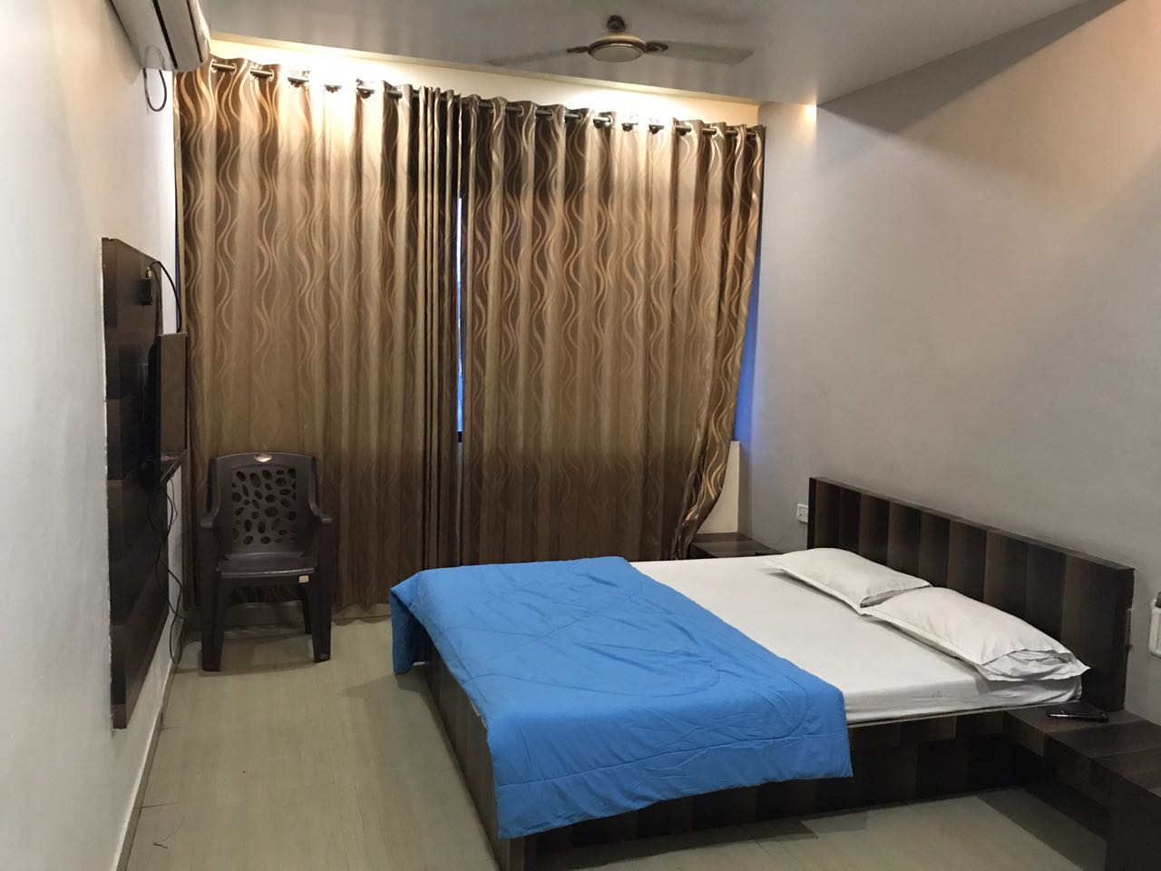 Mahalaxmi Deluxe Lodging - Tap to explore photos